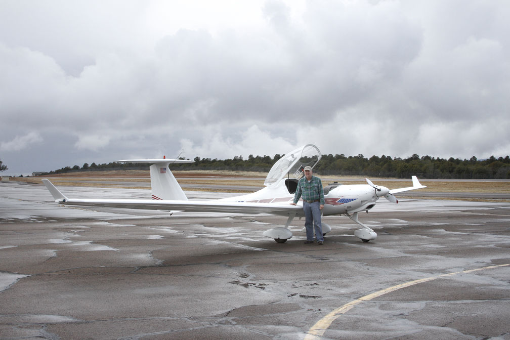 Russ Hustead with motor glider at Payson airport